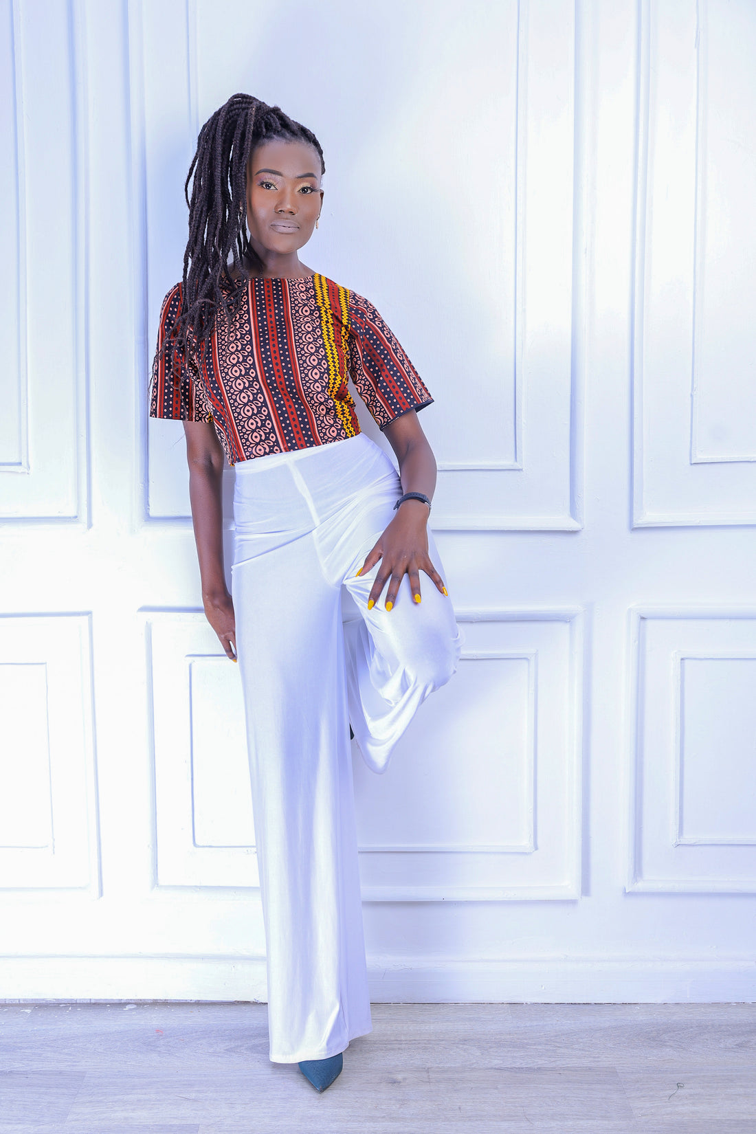African print crop top for the office paired with high-waisted pants